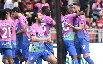 AC Milan’s forward Olivier Giroud (R) celebrates with his teammates after scoring during the Italian Seria A soccer match between Ac Milan and Lecce at the Giuseppe Meazza stadium in Milan, Italy, 6 April 2024. ANSA/DANIEL DAL ZENNARO
