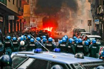 Police car set on fire during clashes with Eintracht Frankfurt's supporters in Naples, Italy, 15 March 2023. Napoli s and Eintracht Frankfurt will play the UEFA Champions League round of 16 second leg soccer match at the Diego Armando Maradona stadium in Naples.
ANSA/CIRO FUSCO