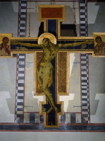 ITALY - DECEMBER 16: Crucifix, 1287-1288, by Cenni di Pepo known as Cimabue (ca 1240-before 1302), tempera on panel, 448x390 cm, after the damage of the 1966 Flood, Basilica of Santa Croce, Florence, Tuscany. Italy, 13th century. Florence, Museo Dell'Opera Di Santa Croce (Santa Croce Museum) (Photo by DeAgostini/Getty Images)