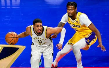 LAS VEGAS, NEVADA - DECEMBER 9: Cam Reddish (5) of Los Angeles Lakers and Tyrese Haliburton (0) of Indiana Pacers in action during NBA In-Season Tournament Championship game between Los Angeles Lakers and Indiana Pacers at the T-Mobile Arena in Las Vegas, Nevada, United States on December 9, 2023. (Photo by Tayfun Coskun/Anadolu via Getty Images)
