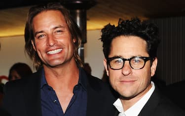 LOS ANGELES, CA - MAY 23: (L-R) Actors Anton Yelchin, Josh Holloway and producer JJ Abrams attend an evening of cocktails and shopping to benefit the Children's Defense Fund hosted by Coach held at Bad Robot on May 23, 2012 in Los Angeles, California.  (Photo by Stefanie Keenan/WireImage)