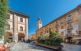 Cuneo, Piedmont, Italy - October 6, 2021: Largo (square) Giovanni Audifreddi near the town hall with a view of the civic tower