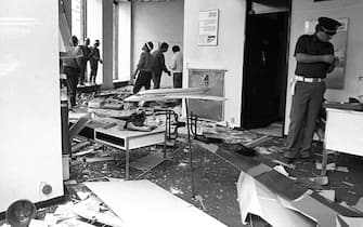 ROME, ITALY - SEPTEMBER 25: Terrorist attack on the offices of the British Airways airline in via Bissolati, with a suitcase bomb  exploded destroying the headquarters of the airline, immediately arrested the bomber is called Hasam Aatab is sixteen on Â Â September 25, 1985 in Rome,Italy. The attack was claimed by the Revolutionary Organization of Socialist Muslims (ORMS). The injured are three Italian employees of British Airways and another person believed to have been a customer. Another 10 people were reported injured, mostly by flying glass. (Photo by Stefano Montesi - Corbis/Getty Images)