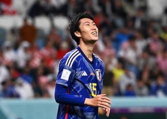 epa10349785 Daichi Kamada of Japan reacts during the FIFA World Cup 2022 round of 16 soccer match between Japan and Croatia at Al Janoub Stadium in Al Wakrah, Qatar, 05 December 2022.  EPA/Neil Hall