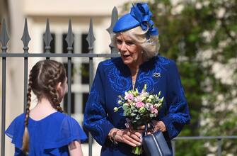 epa10566143 Britain's Camilla (R), the Queen Consort departs the Easter Sunday service at St Georges Chapel at Windsor Castle in Windsor, Britain, 09 April 2023.  EPA/NEIL HALL