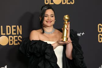 BEVERLY HILLS, CALIFORNIA - JANUARY 07: Lily Gladstone, winner of the Best Performance by a Female Actor in a Motion Picture â   Drama award for "Killers of the Flower Moon," poses in the press room during the 81st Annual Golden Globe Awards at The Beverly Hilton on January 07, 2024 in Beverly Hills, California. (Photo by Kevin Mazur/Getty Images)