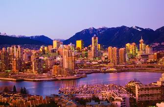 Vancouver cityscape with river at sunset, British Columbia, Canada