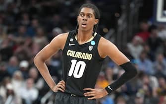 INDIANAPOLIS, INDIANA - MARCH 22: Cody Williams #10 of the Colorado Buffaloes looks on during the NCAA Men's Basketball Tournament - First Round game against the Florida Gators at Gainbridge Fieldhouse on March 22, 2024 in Indianapolis, Indiana. (Photo by Mitchell Layton/Getty Images)