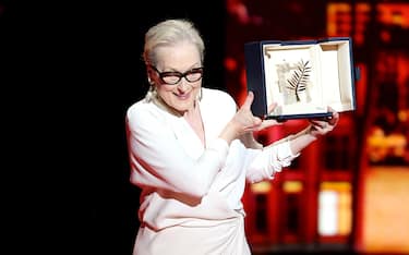 CANNES, FRANCE - MAY 14: Meryl Streep receives the Honorary Palme D’Or Award on stage during the opening ceremony at the 77th annual Cannes Film Festival at Palais des Festivals on May 14, 2024 in Cannes, France. (Photo by Andreas Rentz/Getty Images)