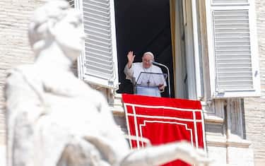 Pope Francis leads the Angelus prayer from the window of his office overlooking St. Peter's Square in Vatican City, 13 August 2023. ANSA/FABIO FRUSTACI
