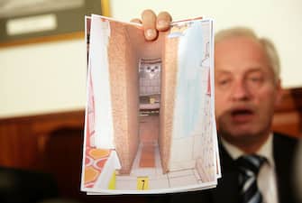 AMSTETTEN, AUSTRIA - APRIL 28:  Colonel Franz Polzer, chief investigator of the district of Lower Austria shows a detail picture of the cellar appartement, where a father imprisoned his daughter for 24 years and had seven children with her,  during a press conference on April 28, 2008 in Amstetten, Austria. According to police Josef Fritzl kept his daughter Elizabeth, now 42, imprisoned in his basement and sexually abused her. Three of the children, now aged 5, 18 and 19, had never seen the light of day until the eldest was recently taken to hospital because of a severe illness.  (Photo by Johannes Simon/Getty Images)