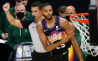 PHOENIX, ARIZONA - JULY 08: Mikal Bridges #25 of the Phoenix Suns celebrates a three point basket against the Milwaukee Bucks during the first half in Game Two of the NBA Finals at Phoenix Suns Arena on July 08, 2021 in Phoenix, Arizona. NOTE TO USER: User expressly acknowledges and agrees that, by downloading and or using this photograph, User is consenting to the terms and conditions of the Getty Images License Agreement. (Photo by Ralph Freso/Getty Images)