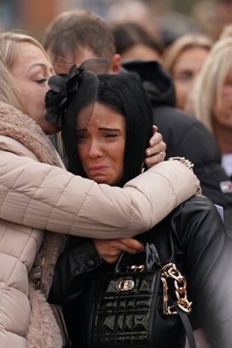 The mother of Indi Gregory, Claire Staniforth (centre) is comforted following her daughter's funeral service at St Barnabus Cathedral, Nottingham. The baby girl died shortly after her life-support treatment was withdrawn after her parents, Dean Gregory and Ms Staniforth, who are both in their 30s and from Ilkeston, Derbyshire, lost legal bids in the High Court and Court of Appeal in London for specialists to keep treating her. Picture date: Friday December 1, 2023.