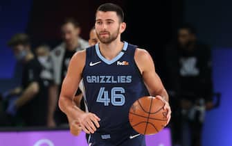 Orlando, FL - AUGUST 11: John Konchar #46 of the Memphis Grizzlies handles the ball during the game against the Boston Celtics on August 11, 2020 at AdventHealth Arena at ESPN Wide World of Sports in Orlando, Florida. NOTE TO USER: User expressly acknowledges and agrees that, by downloading and/or using this Photograph, user is consenting to the terms and conditions of the Getty Images License Agreement. Mandatory Copyright Notice: Copyright 2020 NBAE (Photo by David Sherman/NBAE via Getty Images)