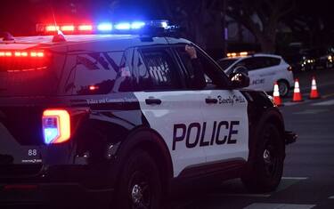 Beverly Hills police officers patrol in their car on November 1, 2020 in Beverly Hills. (Photo by Chris DELMAS / AFP) (Photo by CHRIS DELMAS/AFP via Getty Images)