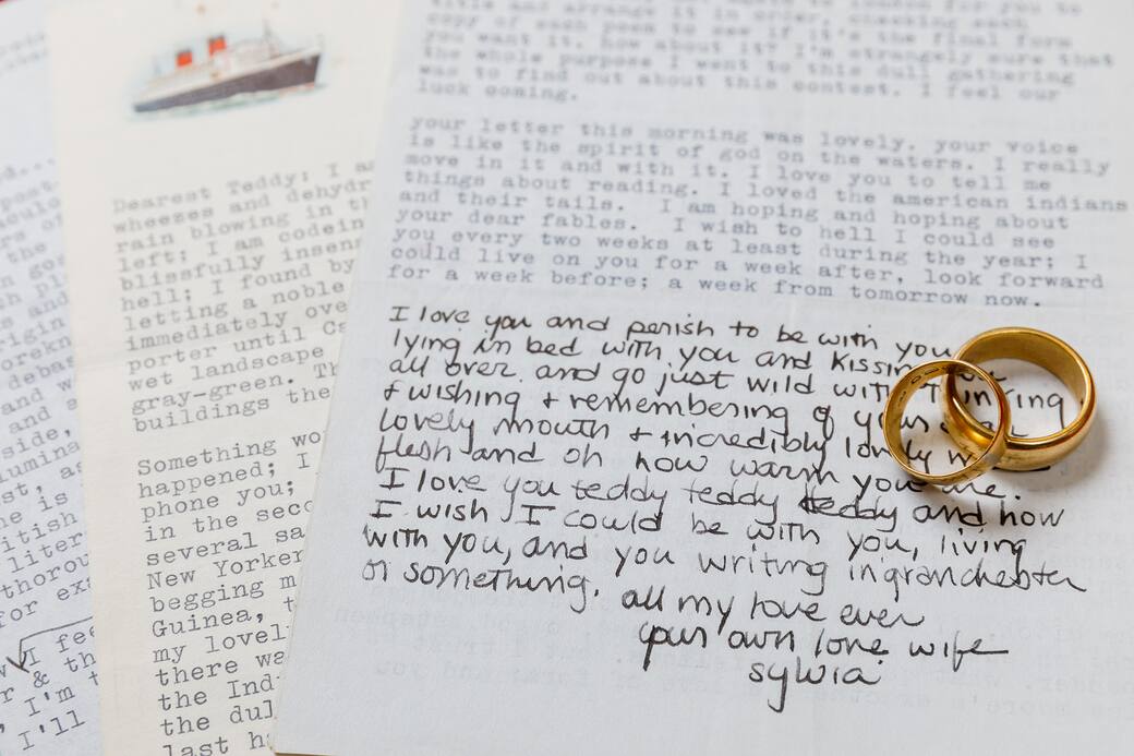 Letters_to_Ted_Hughes_from_Sylvia_Plath_photographed_with_wedding_rings._Courtesy_Sotheby_s.jpg