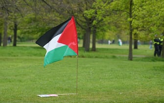 A Palestinian flag in Hyde Park as people take part in a pro-Palestine march in central London. Picture date: Saturday April 27, 2024.