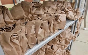 Muhlenberg twp., PA - September 10: A rack with bags containing grab and go breakfasts and lunches. At the Muhlenberg Elementary Center in Muhlenberg twp, PA Thursday morning September 10, 2020 where school district employees were distributing grab and go meals to students. The program has been going on since the start of the COVID-19 pandemic and is continuing this school year as all education in the district is being done virtually. (Photo by Ben Hasty/MediaNews Group/Reading Eagle via Getty Images)