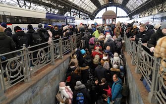 LVIV, UKRAINE - 2022/02/26: People wait for a train at the main railway station of Lviv as they try to leave Ukraine after the Russian military invaded their country. 
Russian troops entered Ukraine on 24 February. (Photo by Mykola Tys/SOPA Images/LightRocket via Getty Images)
