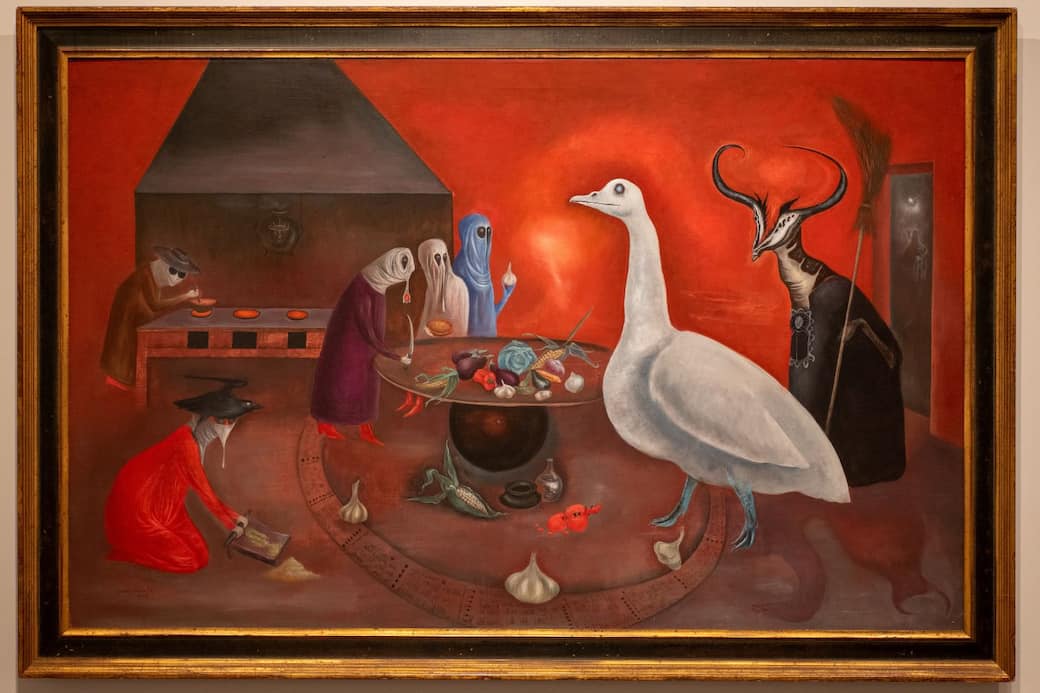 Leonora Carrington, Grandmother Moorhead’s Aromatic Kitchen, 1974 Olio su tela, 79 x 124 cm. The Charles B. Goddard Center for Visual and Performing Arts - Ardmore, Oklahoma © Estate of Leonora Carrington, by SIAE 2025