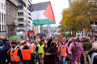BRUSSELS, BELGIUM - NOVEMBER 11: Thousands of people march in the streets of Brussels under the slogan: 'Stop the bloodshed', to show their support for the Palestinian people on November 11, 2023 in Brussels, Belgium. Flying Palestinian flags and brandishing signs demanding to "Stop the bombing of Gaza", demonstrators shout "Free Palestine" and "ceasefire now", five weeks after the deadly attack by the Palestinian Islamist movement Hamas against Israel, which in response massively bombs the Gaza Strip. (Photo by Thierry Monasse/Getty Images)