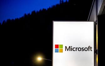 This photograph taken on January 19, 2023 shows the logo of the American corporation Microsoft displayed during the World Economic Forum (WEF) annual meeting in Davos. (Photo by Fabrice COFFRINI / AFP) (Photo by FABRICE COFFRINI/AFP via Getty Images)