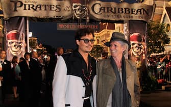 Actor Johnny Depp and actor/musician Keith Richards arrive at the world premiere of "Pirates of the Caribbean: On Stranger Tides" at Disneyland on May 7, 2011 in Anaheim, California.