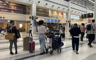 BEIRUT, LEBANON - APRIL 14: Passengers wait at Beirut Rafic Hariri International Airport as Lebanon closed its airspace to all flight after the Iran's attack on Israel, in Beirut, Lebanon on April 14, 2024. (Photo by Houssam Shbaro/Anadolu via Getty Images)