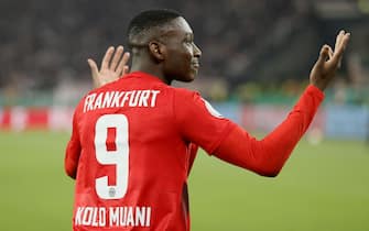 epa10607223 Frankfurt's Randal Kolo Muani celebrates after scoring the 1-3 during the German DFB Cup semi-final soccer match between VfB Stuttgart and Eintracht Frankfurt in Stuttgart, Germany, 03 May 2023.  EPA/RONALD WITTEK CONDITIONS - ATTENTION: The DFB regulations prohibit any use of photographs as image sequences and/or quasi-video.