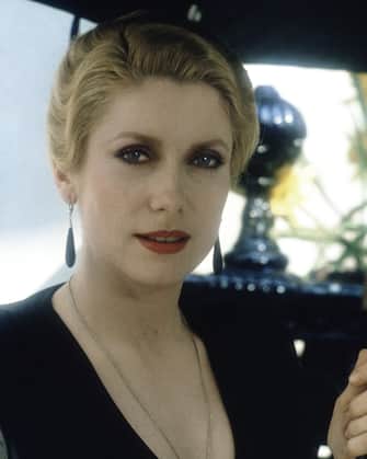 French actress Catherine Deneuve on the set of The Hunger, directed by Tony Scott. (Photo by Metro-Goldwyn-Mayer Pictures/Sunset Boulevard/Corbis via Getty Images)