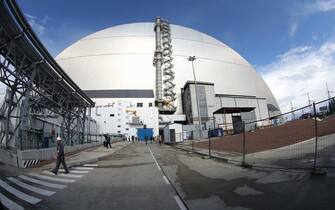 July 10, 2019 - Kyiv Region, Ukraine - The New Safe Confinement (NSF) seals off the Object Shelter, also known as the Sarcophagus, a temporary structure built in 1986 over the debris of the 4th reactor of the Chornobyl Nuclear Power Plant (ChNPP), Kyiv Region, northern Ukraine, July 10, 2019. The NSF has been transferred from NOVARKA to the ChNPP State Specialised Enterprise. Ukrinform. (Credit Image: © Tarasov/Ukrinform via ZUMA Wire)