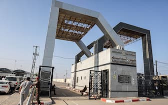 This picture taken on November 1, 2023 shows a view of the gate to the Rafah border crossing with Egypt in the southern Gaza Strip. Scores of foreign passport holders trapped in Gaza started leaving the war-torn Palestinian territory on November 1 when the Rafah crossing to Egypt was opened up for the first time since the October 7 Hamas attacks on Israel, according to AFP correspondents. (Photo by Mohammed ABED / AFP) (Photo by MOHAMMED ABED/AFP via Getty Images)