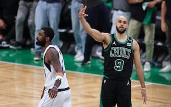 BOSTON, MASSACHUSETTS - JUNE 09: Derrick White #9 of the Boston Celtics reacts after a made basket against the Dallas Mavericks during the fourth quarter in Game Two of the 2024 NBA Finals at TD Garden on June 09, 2024 in Boston, Massachusetts. NOTE TO USER: User expressly acknowledges and agrees that, by downloading and or using this photograph, User is consenting to the terms and conditions of the Getty Images License Agreement. (Photo by Adam Glanzman/Getty Images)