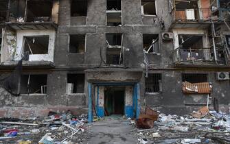 MARIUPOL, UKRAINE - MARCH 30, 2022: A view of an apartment building damaged in the embattled city. Tensions started heating up in Donbass on February 17, with the Donetsk and Lugansk People's Republics reporting the most intense shellfire from Ukraine in months. Early on February 24, President Putin announced the start of a special military operation by the Russian Armed Forces in response to appeals for help from the leaders of both republics. Nikolai Trishin/TASS/Sipa USA