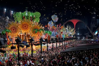 TOPSHOT - Floats pass by as members of the Grande Rio samba school perform during the first night of Rio's Carnival parade at the Sambadrome Marques de Sapucai in Rio de Janeiro, Brazil on February 19, 2023. (Photo by MAURO PIMENTEL / AFP) (Photo by MAURO PIMENTEL/AFP via Getty Images)