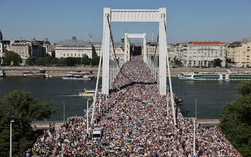 BUDAPEST, HUNGARY - JUNE 28: Participants take part in the Budapest Pride on June 28, 2025 in Budapest, Hungary. Early in 2025, Hungary passed a law restricting the freedom of assembly by connecting it to a previous law from 2021 prohibiting the public portrayal to children of 'divergence from self-identity corresponding to sex at birth, sex change or homosexuality'. Consequently, events such as Pride marches are illegal in the country. The LGBTQ+ community are defying the ban and holding their Pride event on the streets of Budapest. (Photo by Janos Kummer/Getty Images)