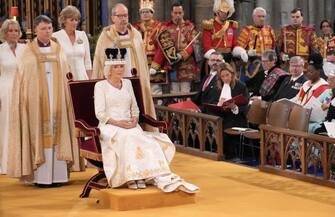 LONDON, ENGLAND - MAY 06: Queen Camilla is crowned with Queen Mary's Crown during her coronation ceremony at Westminster Abbey on May 6, 2023 in London, England. The Coronation of Charles III and his wife, Camilla, as King and Queen of the United Kingdom of Great Britain and Northern Ireland, and the other Commonwealth realms takes place at Westminster Abbey today. Charles acceded to the throne on 8 September 2022, upon the death of his mother, Elizabeth II. (Photo by Jonathan Brady - WPA Pool/Getty Images)