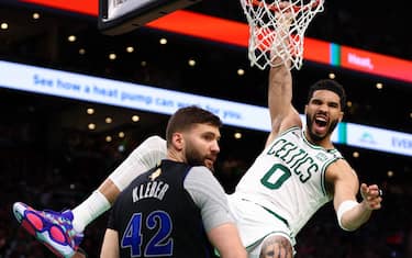 BOSTON, MASSACHUSETTS - JUNE 06: Jayson Tatum #0 of the Boston Celtics reacts as he dunks the ball against Maxi Kleber #42 of the Dallas Mavericks during the second quarter in Game One of the 2024 NBA Finals at TD Garden on June 06, 2024 in Boston, Massachusetts. NOTE TO USER: User expressly acknowledges and agrees that, by downloading and or using this photograph, User is consenting to the terms and conditions of the Getty Images License Agreement. (Photo by Maddie Meyer/Getty Images)