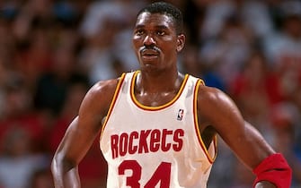 HOUSTON, TX - JUNE 10:  Hakeem Olajuwon #34 of the Houston Rockets stands on the court during Game Two of the NBA Finals against the New York Knicks on June 10, 1994 at The Summit in Houston, Texas. NOTE TO USER: User expressly acknowledges that, by downloading and or using this photograph, User is consenting to the terms and conditions of the Getty Images License agreement. Mandatory Copyright Notice: Copyright 1994 NBAE (Photo by Bill Baptist/NBAE via Getty Images)