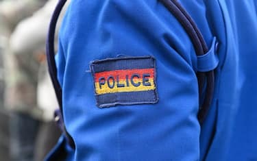 The chevron Police on the sleeve of a blue police suit in Nairobi. Kenya, Africa