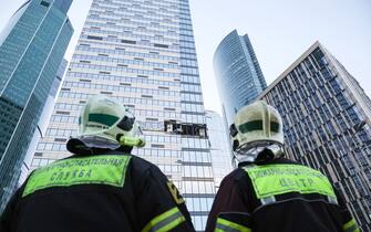 RUSSIA, MOSCOW - JULY 30, 2023: First responders are seen at the  Moscow International Business Centre (Moscow City) where explosions have hit the Oko-2 tower and a tower of the IQ-Quarter complex. Earlier, Moscow Mayor Sergei Sobyanin said the city was attacked by Ukrainian drones; according to the Russian Defence Ministry, three Ukrainian UAVs took part in the attack, one of them destroyed in the air over the Moscow Region's Odintsovo District. Moscow's Vnukovo Airport was temporarily closed for traffic amid the accident. Mikhail Tereshchenko/TASS/Sipa USA