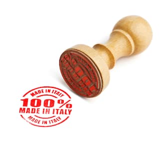 a100% MADE IN ITALYaA rubber stamp. Clipping path on rubber stamp.