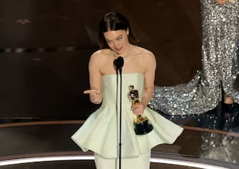 HOLLYWOOD, CALIFORNIA - MARCH 10: Emma Stone accepts the Lead Actress award for "Poor Things" onstage during the 96th Annual Academy Awards at Dolby Theatre on March 10, 2024 in Hollywood, California. (Photo by Kevin Winter/Getty Images)