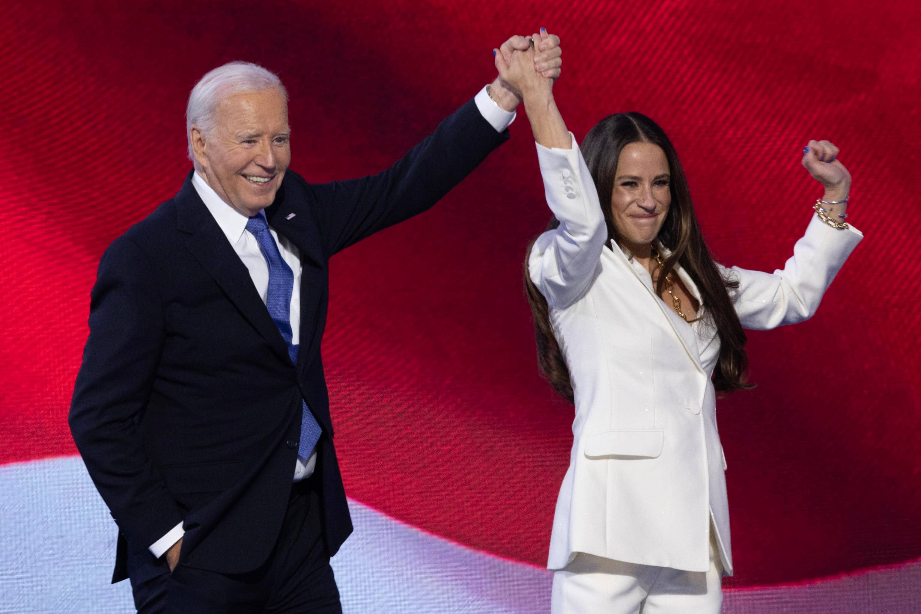 epa11556056 US President Joe Biden (L) greets his daughter Ashley Biden (R) after she introduced him during the opening night of the Democratic National Convention (DNC) at the United Center in Chicago, Illinois, USA, 19 August 2024. The 2024 Democratic National Convention is being held from 19 to 22 August 2024, during which delegates of the United States' Democratic Party will vote on the party's platform and ceremonially vote for the party's nominee for president, Vice President Kamala Harris, and for vice president, Governor Tim Walz of Minnesota, for the upcoming presidential election.  EPA/MICHAEL REYNOLDS