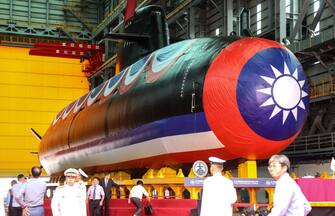 The Taiwan Navy's Hai Kun submarine unveiled during an event at CSBC Corp.'s dockyard in Kaohsiung, Taiwan, on Thursday, Sept. 28, 2023. Taiwan unveiled a prototype of its first submarine assembled at home as it prepares to stave off a potential invasion by China, a feat only made possible with the secretive help of other countries. Photographer: I-Hwa Cheng/Bloomberg via Getty Images