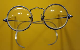 John Lennon's  round-lens "Windsor" spectacles on display in a new exhibit at the Rock & Roll Hall of Fame Annex NYC  May 11, 2009 entitiled " John Lennon: The New York City Years." Lennon, one of the founders of the Beatles, was shot and killed outside his NYC apartment building on December 8, 1980. AFP PHOTO/ TIMOTHY A. CLARY (Photo credit should read TIMOTHY A. CLARY/AFP via Getty Images)