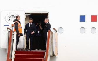 French President Emmanuel Macron arrives at Beijing Capital International Airport in Beijing on April 5, 2023. (Photo by GONZALO FUENTES / POOL / AFP) (Photo by GONZALO FUENTES/POOL/AFP via Getty Images)