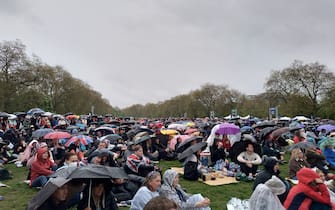 Members of the public in Hyde Park, London, watch a screening of the coronation. Picture date: Saturday May 6, 2023.