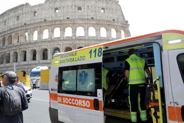 ROME, ITALY, JULY 18: A view of ambulance in front of the Colosseum during a sultry day in Rome, Italy, on July 18, 2023. Temperatures in excess of 40 degrees do not stop tourists and visitors from walking among the monuments. (Photo by Pablo Esparza/Anadolu Agency via Getty Images)