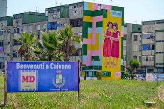 The mural depicting two girls welcomes the Parco Verde (Green Park) of Caivano ( Naples) where two cousins would be raped by some boys almost all minors, 25 August 2023 ANSA / CIRO FUSCO